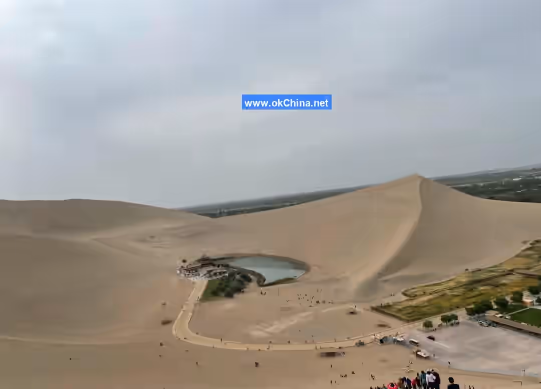 Mingshashan Mountain And Crescent Moon Shaped Spring Scenic Area