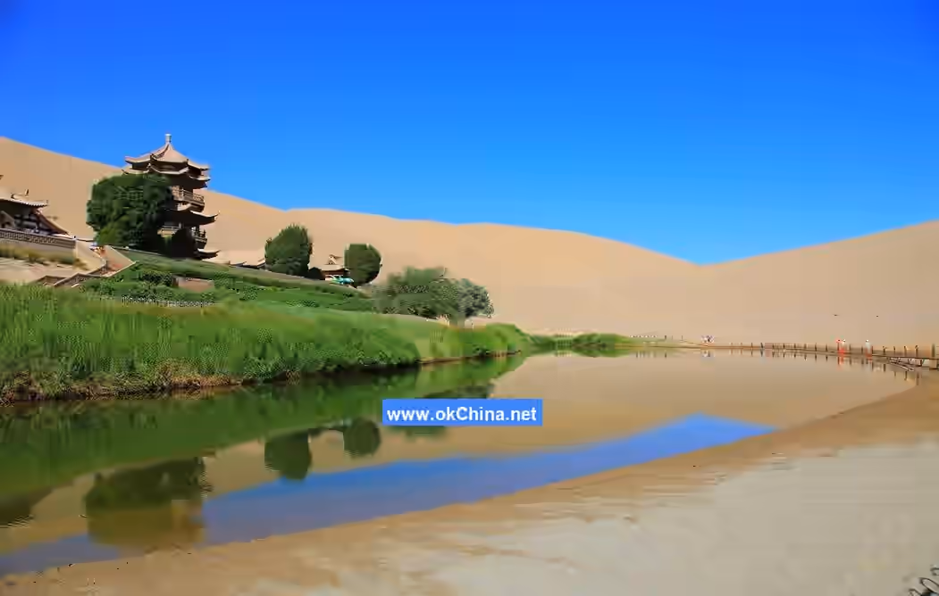 Mingshashan Mountain And Crescent Moon Shaped Spring Scenic Area